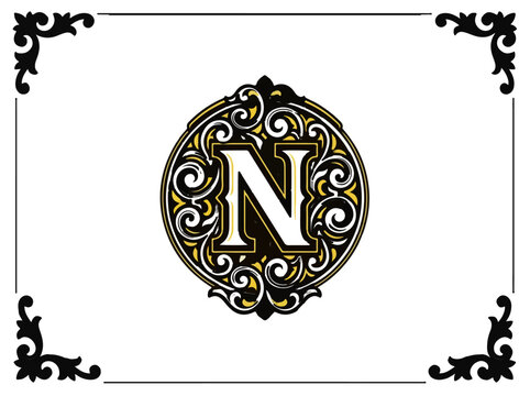 Ornate decorative letter N with gold and black swirls