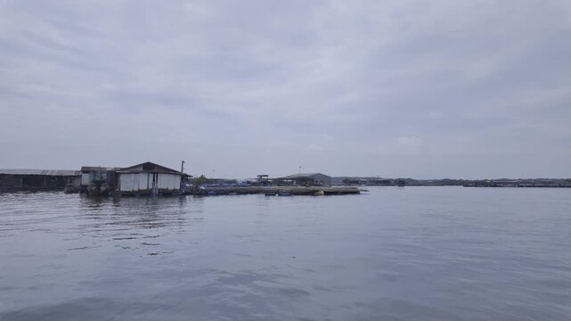 Aerial drone view of oyster farming rafts on the river in Long Son, near Ho Chi Minh City, Vietnam.