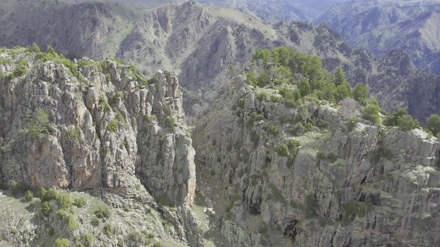 A drone video of the Caucasus Mountains, the Dzhily‑Su Valley, and the Pkhia Pass, Arkhyz, Russia, 2026.


