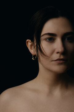 Blurred Portrait Minimalist Gold Earrings Black Studio Background