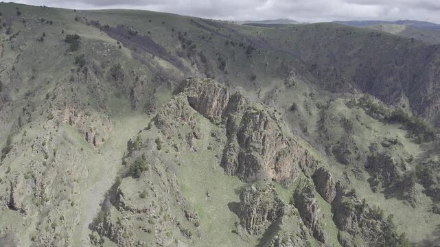 A drone video of the Caucasus Mountains, the Dzhily‑Su Valley, and the Pkhia Pass, Arkhyz, Russia, 2026.

