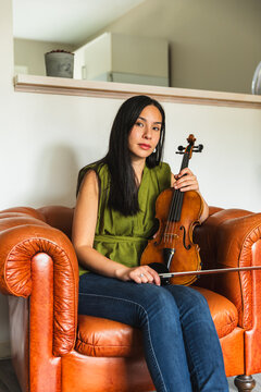 Portrait of a Confident Young Female Violinist