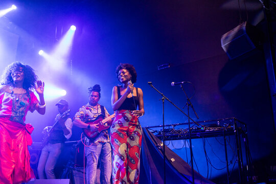 African american singer performing live with music band