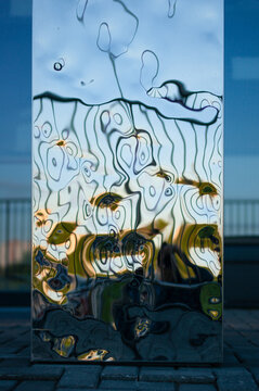 Abstract patterned glass with fluid, organic shapes