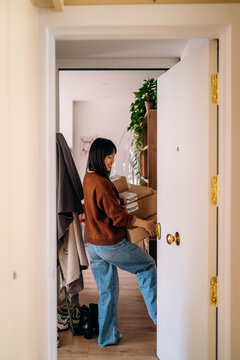 A woman with boxes in her hands