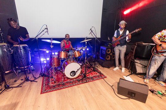 Musicians playing live music together on stage