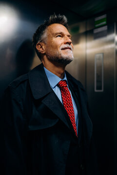 Businessman in the elevator