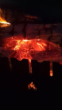 Glowing Hot Coals Burning in Fireplace and BBQ Grill, Close Up Fire Video, Vertical 9:16