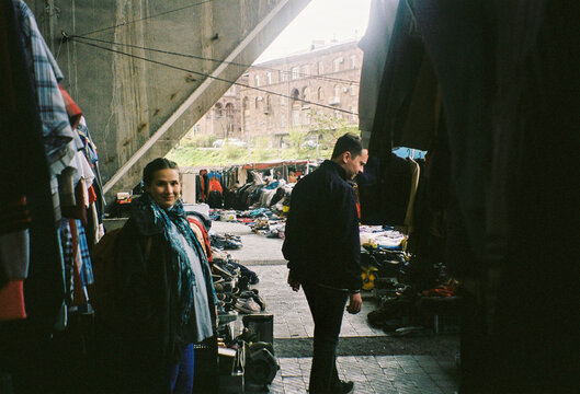 Market Scene Showing People and Clothing in a Busy Area