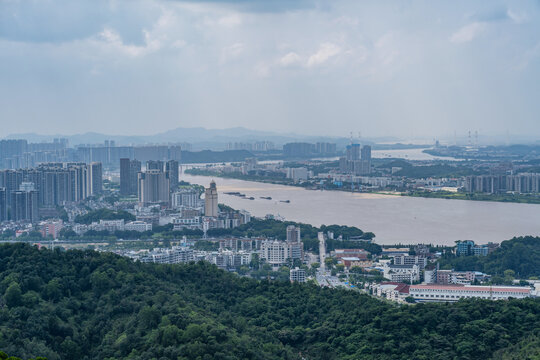Riverside residential building with river views along the Xijiang River in Jiangmen City, China.