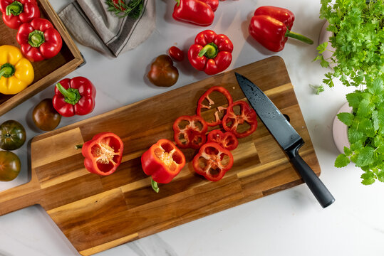 Fresh red paprika on cutting board