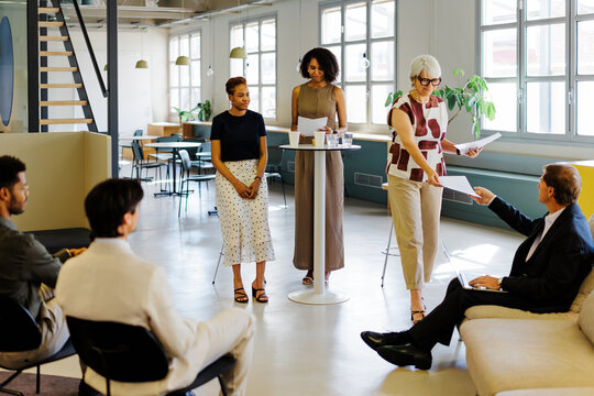 Professionals networking in a modern office space