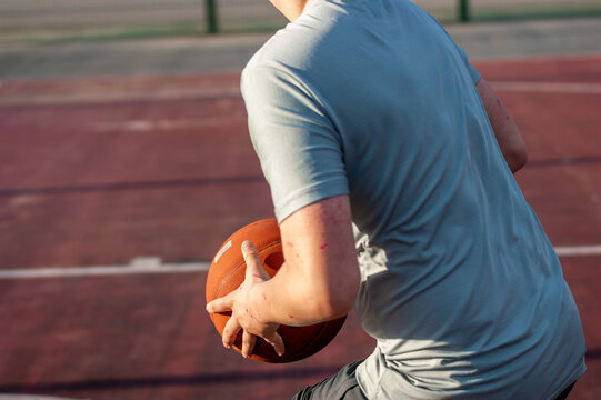 anonymous basketball at outdoor court