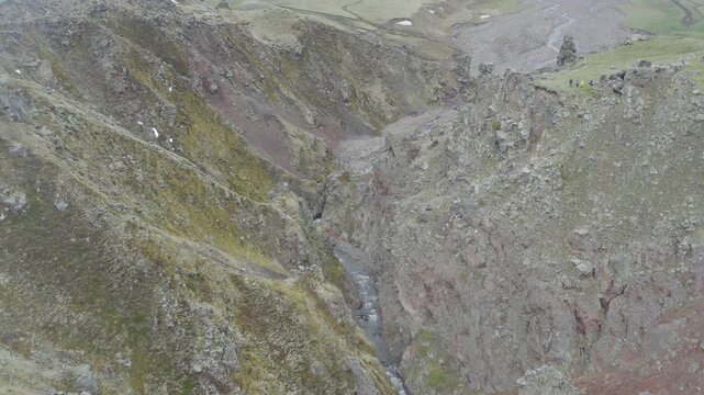 A drone video of the Caucasus Mountains, the Dzhily‑Su Valley, and the Pkhia Pass, Arkhyz, Russia, 2026.

