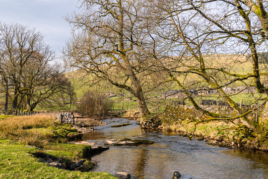 A spring pastoral HDR image of the River Skirfare, at Halton Gill in Littondale, in the Yorkshire dales National Park, England.