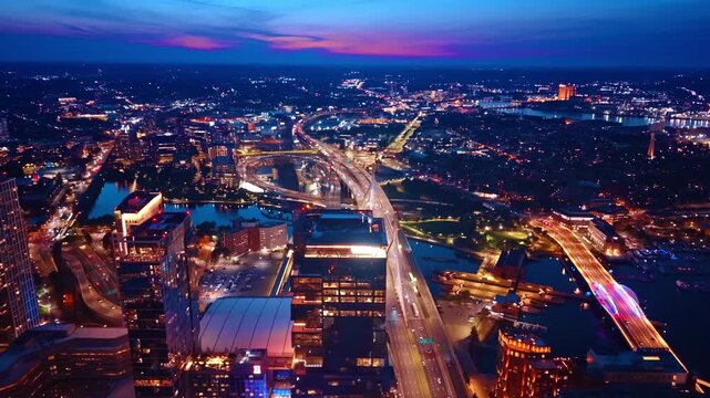 Luminous scenery of modern Boston, Massachusetts, USA at dusk time. Aerial perspective on the vibrant city with lively nightlife.