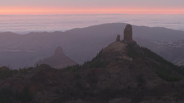 Incredible aerial view of Roque Nublo and Roque Bentayga in Gran Canaria. A beautiful sunset.