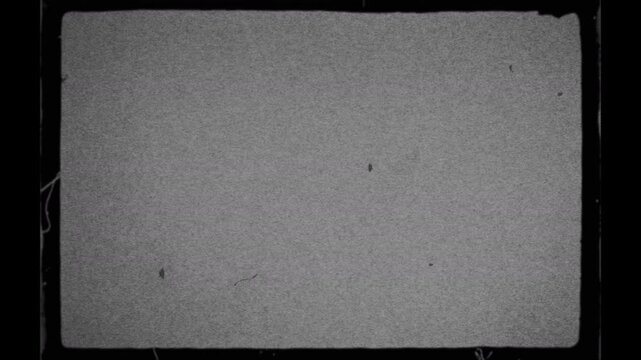 Vintage film frame texture overlay with dust and scratches.