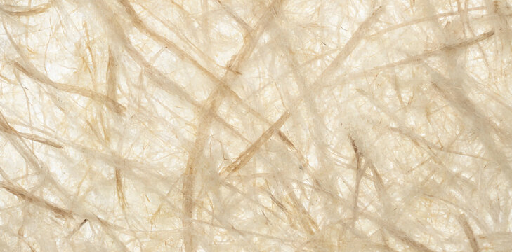 Natural textured beige handmade paper fibers macro close up with texture background light colored handmade background material recycled abstract structure artistic environment