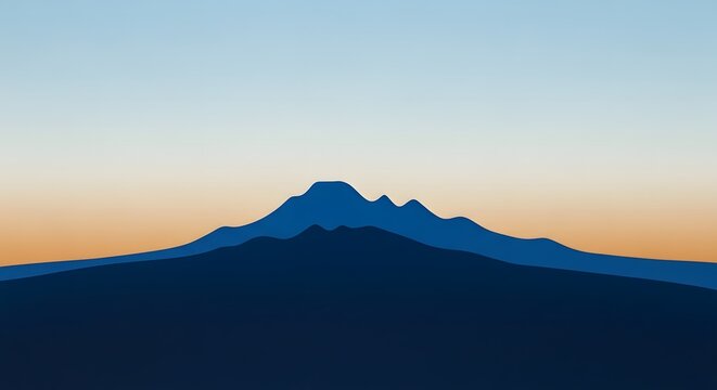Distant mountain range silhouette during twilight with gradient sky and serene blue hues