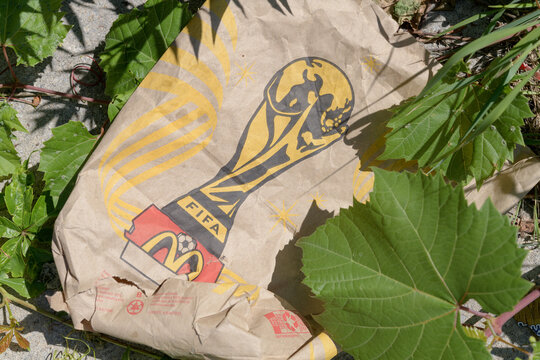 discarded McDonald's Canada paper bag with FIFA World Cup trophy logo in Toronto