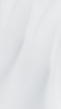 Abstract reflective ripples and milky liquid waves flowing across a white satin-like surface, 3D render seamless Vertical video.