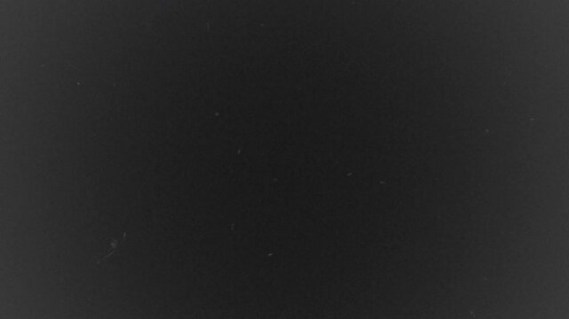 Old Film Scratches Shimmer Overlay. 4K Retro Vintage Film Dust Animation.
