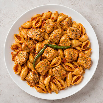 Spicy Chicken Pasta Shells with Tomato Sauce Top View
