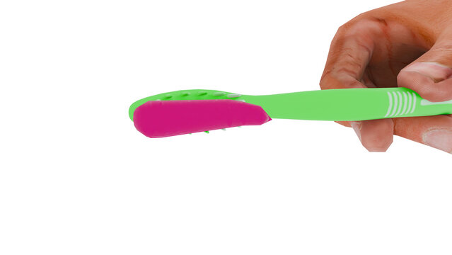 Hand holding green toothbrush with pink toothpaste isolated cutout