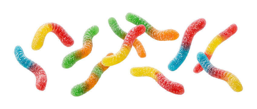 Falling colorful gummy worm candies with sugar coating isolated on transparent background