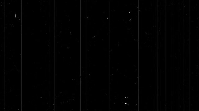 Vintage analog film overlay featuring realistic dust particles, fine scratches, cinematic grain, soft light leaks, flickering texture, distressed old movie effect, black screen background. 4k video
