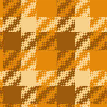 Traditional tartan plaid styling combines a structured check grid with a woven fabric finish. Orange and amber tones shape a seamless textile design with classic fabric heritage for fashion textiles.