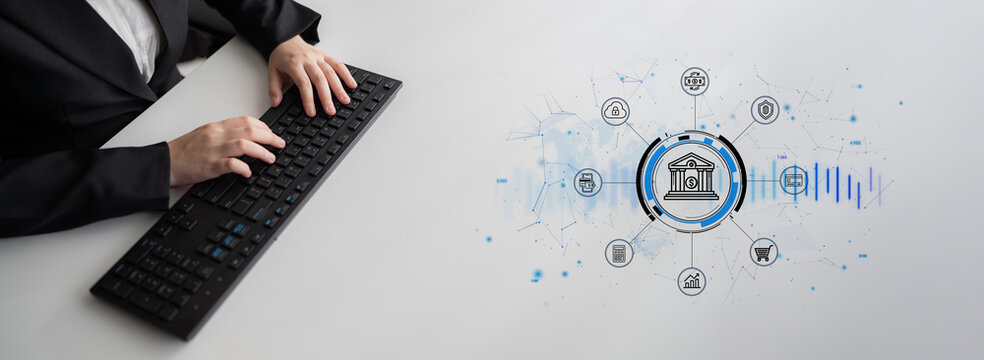 Professional in Formal Attire Typing on Keyboard with Data Visualizations Representing Financial and Banking Concepts in a Modern Office Environment. Entropy.