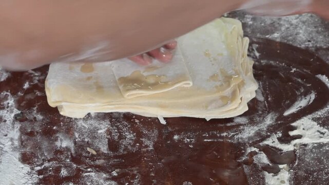 Hands of a Latino man making sweet bread.