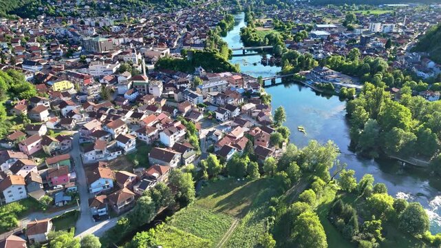 Aerial view of Bosanska Krupa town and emerald Una river in summer, Bosnia and Herzegovina