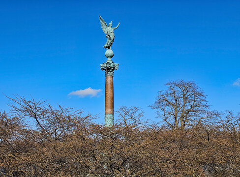 Wonderful views of Copenhagen, Denmark, with colorful houses and sculptures in beautiful weather