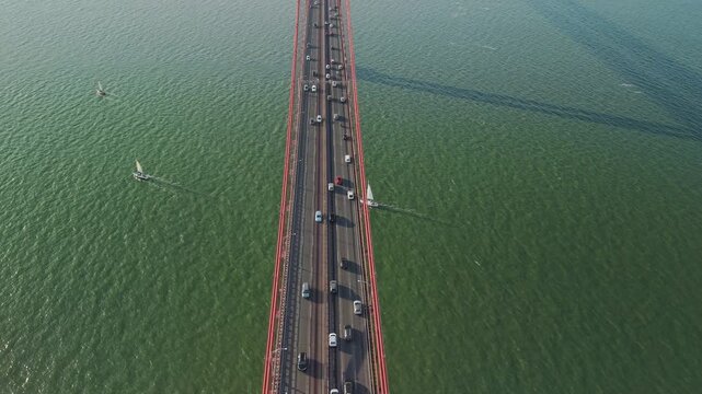 Aerial View of 25 de Abril Bridge and Sailboats