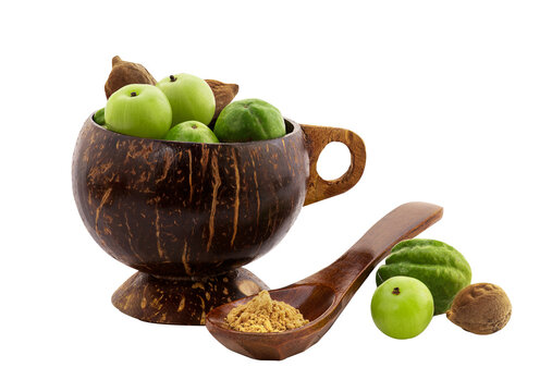 Indian Gooseberry ,terminalia chebula and terminalia bellirica fruits and powder on transparent background.