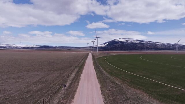 Aerial View of a Wind Farm Amid Farmland on the Rural Plains of Bridger, Montana