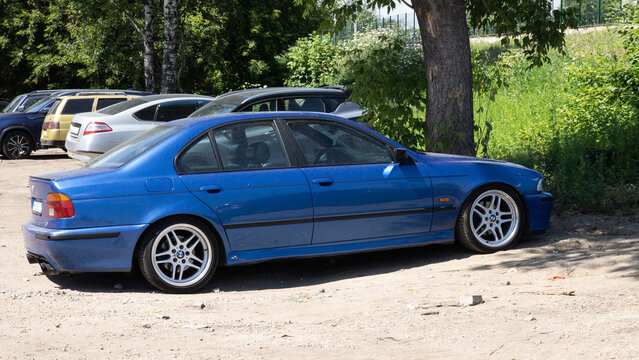 BMW 5 Series E39 sedan parked in outdoor area showing classic automotive design and vehicle styling