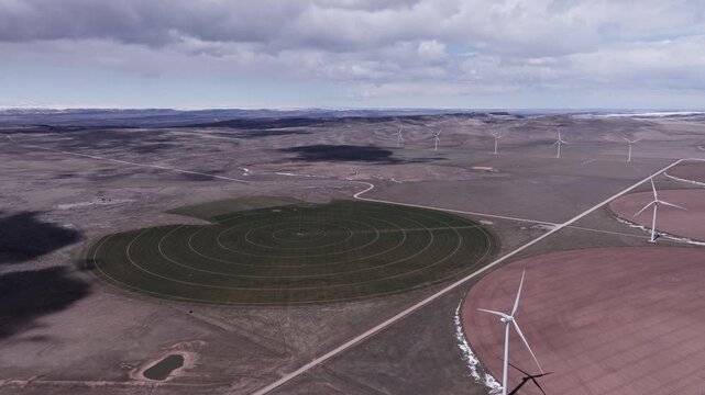 Aerial View of a Wind Farm Amid Farmland on the Rural Plains of Bridger, Montana