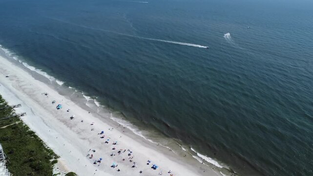 Vilano Beach boats and beach goers