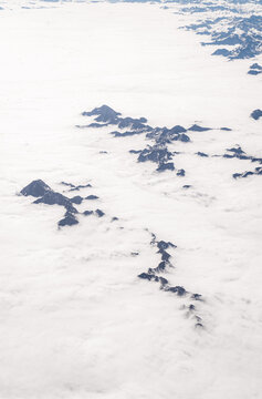 Aerial view of Pyrenees peaks above cloud sea in Europe