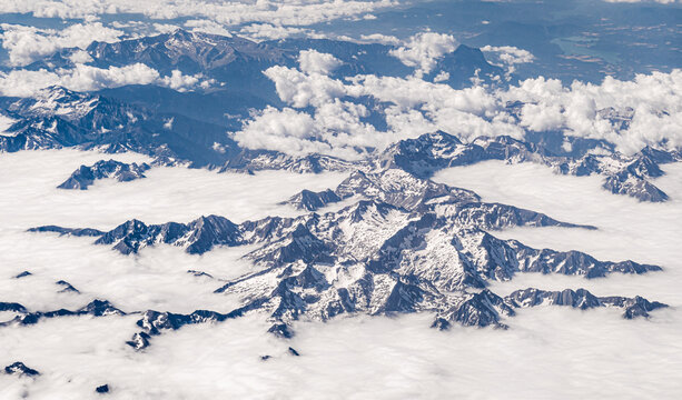 Aerial view of the Pyrenees above clouds on a clear day