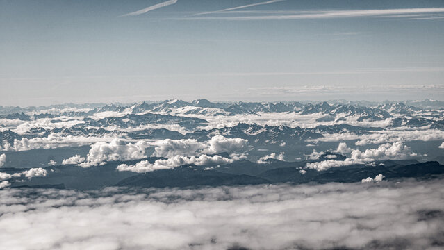 Panoramic Pyrenees mountain range above clouds in Europe