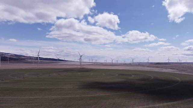 Aerial View of a Wind Farm Amid Farmland on the Rural Plains of Bridger, Montana