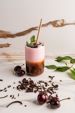 Chocolate cherry smoothie with mint garnish