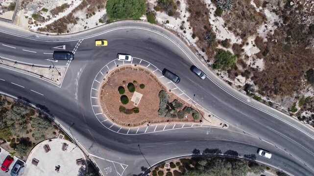 Naxxar, Malta 25.07.2026 - Traffic island near Salina bay. Aerial