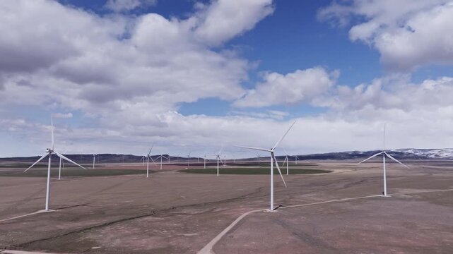 Aerial View of a Wind Farm Amid Farmland on the Rural Plains of Bridger, Montana