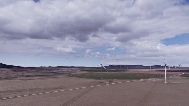 Aerial View of a Wind Farm Amid Farmland on the Rural Plains of Bridger, Montana